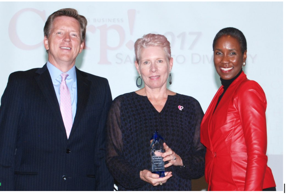 Molly MacDonald receiving Corp! Diversity Business Leader Award