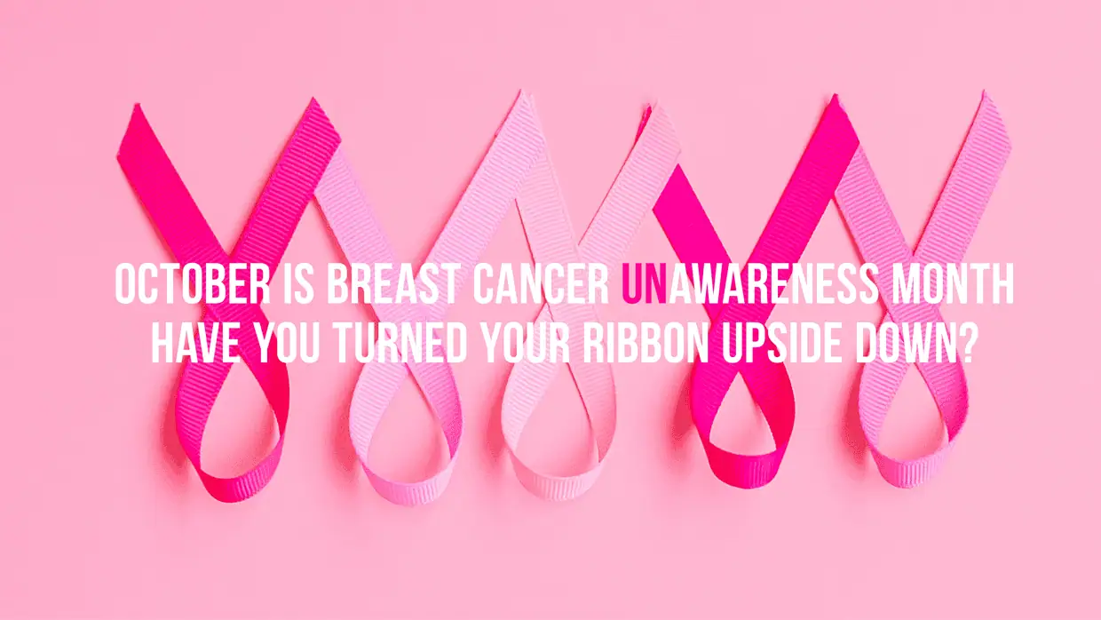 Fondo rosa con cintas rosas al revés que simbolizan la concienciación sobre el cáncer de mama. El texto dice: 'October is Breast Cancer Unawareness Month. Have you turned your ribbon upside down?' El tono es de pregunta.