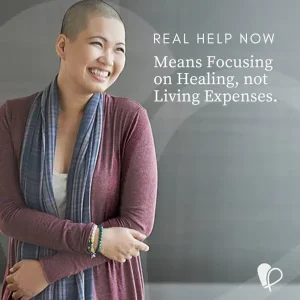 Una persona sonriente con cabello corto, usando un pañuelo y un suéter, está de pie con los brazos cruzados. El texto dice: "REAL HELP NOW", marca registrada de Pink Fund, means focusing on healing, not living expenses.